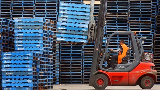 Giving a boost ... the invention of the gas-powered forklift trucks in 1937 led to rise of the pallet.