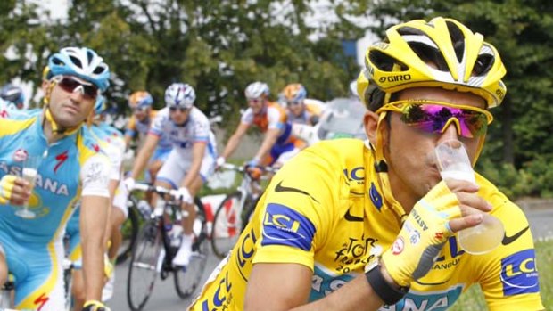 Champagne ride . . . Alberto Contador heads towards Paris on the final stage of the Tour de France.