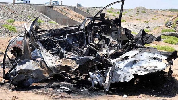 The wreckage of a car after the missile strike in Port Sudan.