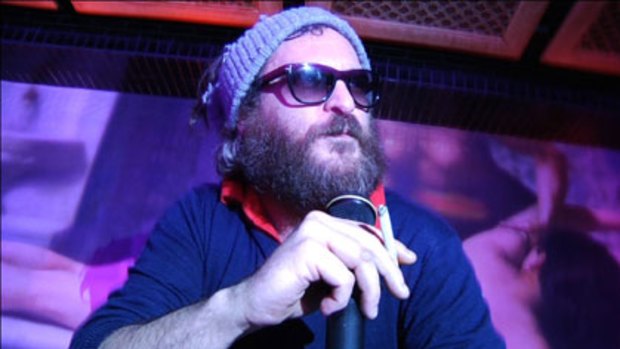 Joaquin Phoenix in hip-hop mode ... if the film is a prank then Phoenix has given the performance of a lifetime, which means he could win an Oscar for playing himself.