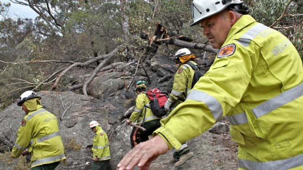 A Remote Area Fire Team part of the National Parks and wildlife fire fighting squad in a remote section of the Bargo River Gorge.