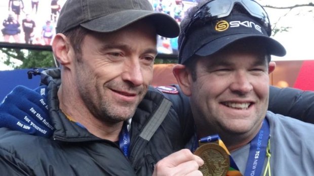 A teary Hugh Jackman met best friend Gus Worland at the finish line of the NYC marathon.