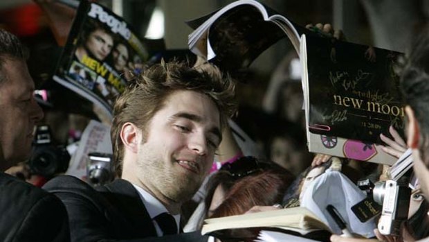 The hysteria Robert Pattinson causes means he needs a  team of 25 bodyguards at premieres to protect him from his young  fans ... and their equally fanatical  mothers.