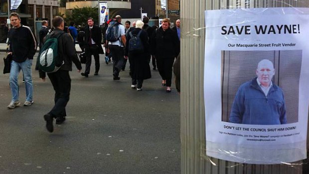 "Save Wayne" posters have been placed around the city.