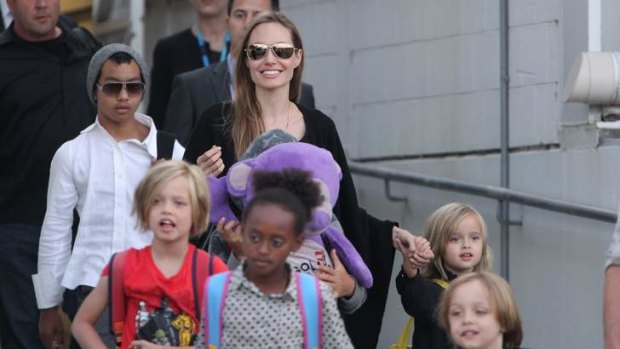 Angelina Jolie with four of her six children: the Jolie-Pitt family should be commended for their efforts to be culturally conscious, particularly when it comes to their diverse brood.