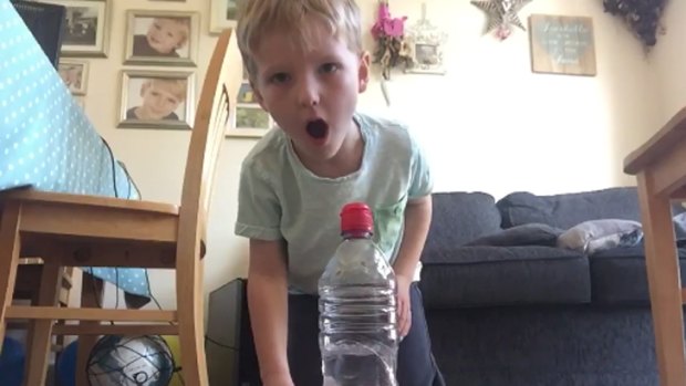 A 5-year-old boy nails the 'bottle flip' challenge.