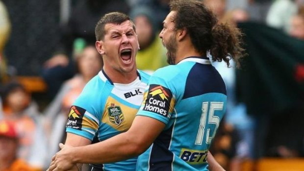 Gold Coast forward Greg Bird celebrates the upset win over the Titans at Leichhardt Oval on the weekend.