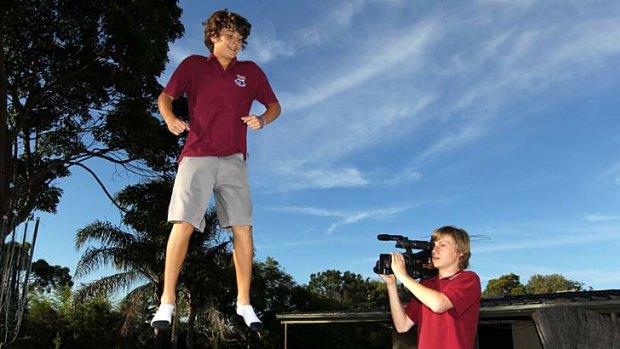 Taking action ... teen filmmaker Darcy Malcolm gets behind the camera with his schoolmates.