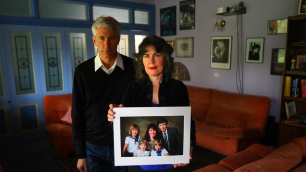 Chrissie Foster and her husband, Anthony, with a portrait of their family, torn apart from church sex crimes.