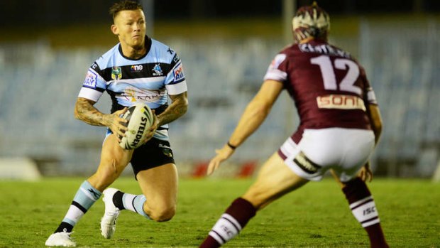 Hamstring worries: Cronulla five-eighth Todd Carney on the attack during a recent trial against Manly Sea Eagles at Remondis Stadium.