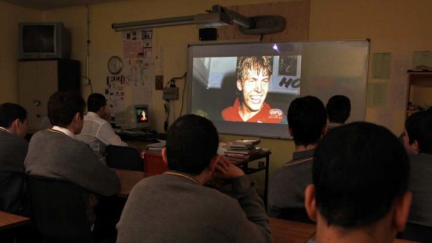 History teacher Eugene Ryan shows Youtube videos of Jim Stynes to a class of boys in Stynes's former school, De La Salle College.
