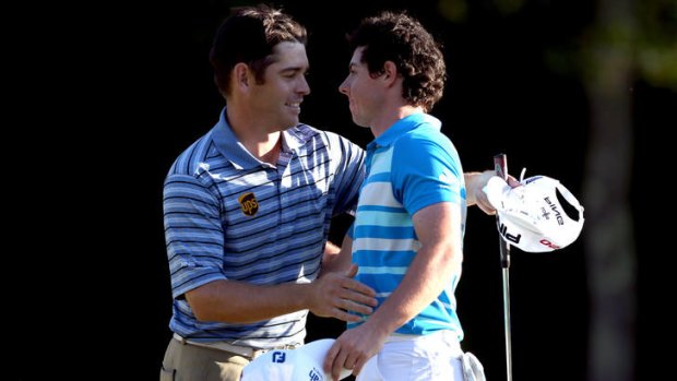 Louis Oosthuizen, left,  congratulates Rory McIlroy after the Deutsche Bank Championship.