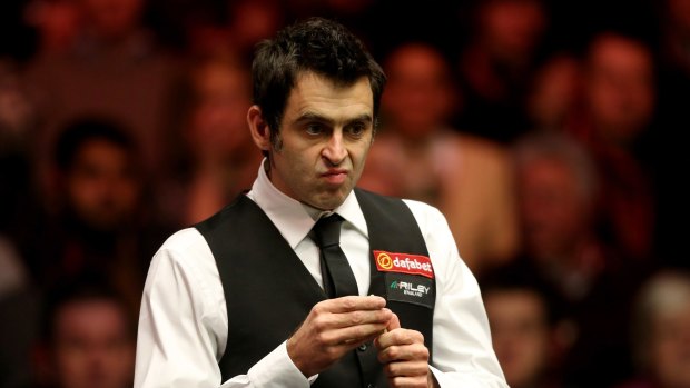 Chalking up another one: Ronnie O'Sullivan on his way to a record-equalling break in London.