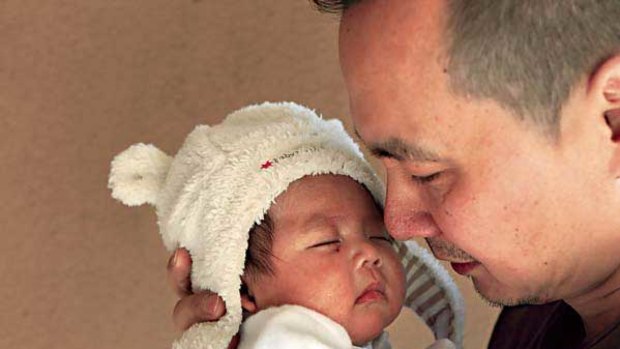 Jason Zheng with his two-month-old son, Alexander. <i>Picture: Jacky Ghossein</i>