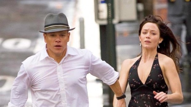 Does this hat make my head look big?: Matt Damon and Emily Blunt go on the run in the sci-fi romance The Adjustment Bureau.