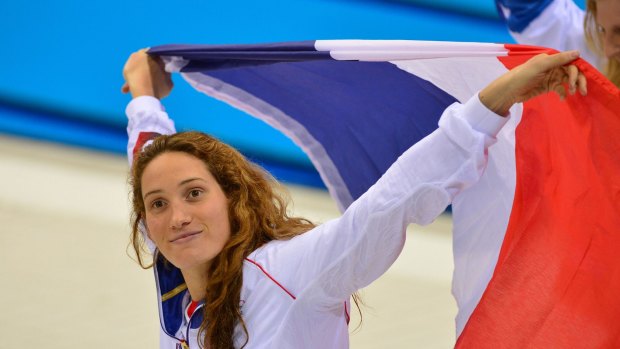 Camille Muffat, pictured here celebrating at the 2012 London Olympic Games, has died in a helicopter crash in Argentina. 