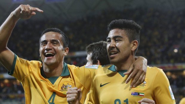 Goalscorers: Tim Cahill, left, and Massimo Luongo celebrate during the Socceroos' 4-1 win over Kuwait in the Asian Cup opener.