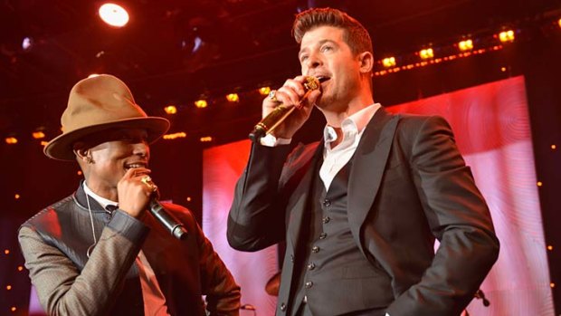 Up for record of the year: Pharrell Williams and Robin Thicke.
