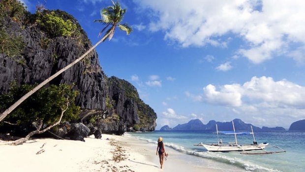 Strolling along the beach in El Nido, Palawan.