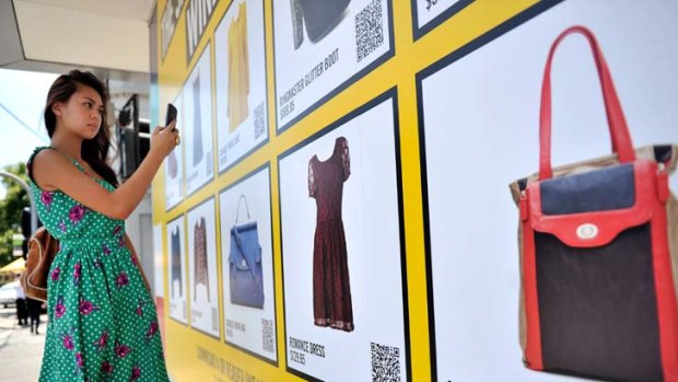 "Showrooming" ... a new craze allowing shoppers to compare prices by scanning barcodes.