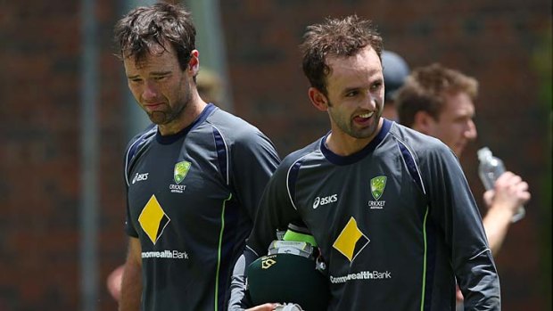 All to prove ... Rob Quiney, left, with Nathan Lyon during training at the Gabba this week.