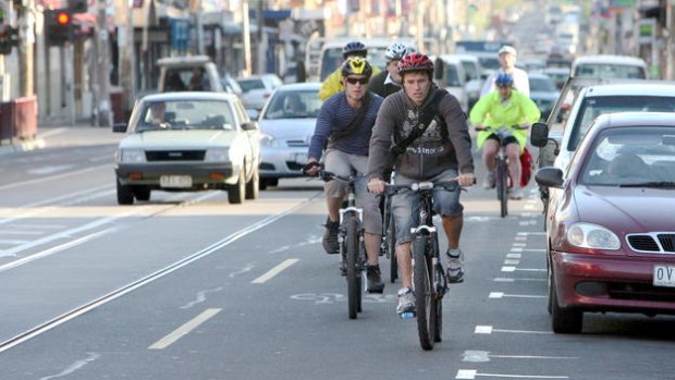 Cyclists on Brunswick Street in Fitzroy.