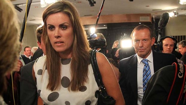 Playing down claims of sexism ... Peta Credlin and the Opposition Leader, Tony Abbott.