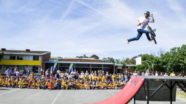 Arawang Primary School celebrate Ride or Walk to School day with Backbone BMX's Mike Ross.