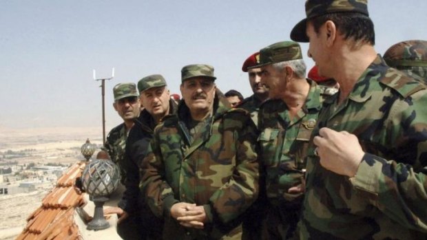 Syria's Defence Minister General Fahad Jassim al-Freij (centre) visits Yabroud.