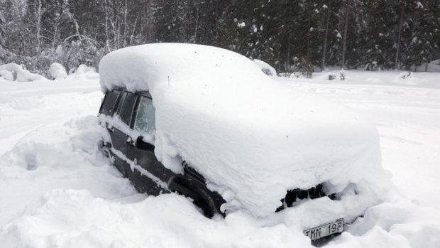 The snowed-in car in the woods north of Umea in northern Sweden.
