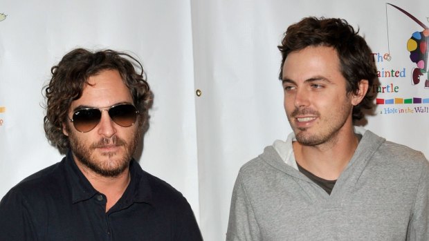 Affleck, right, with his brother-in-law Joaquin Phoenix in October 2008.