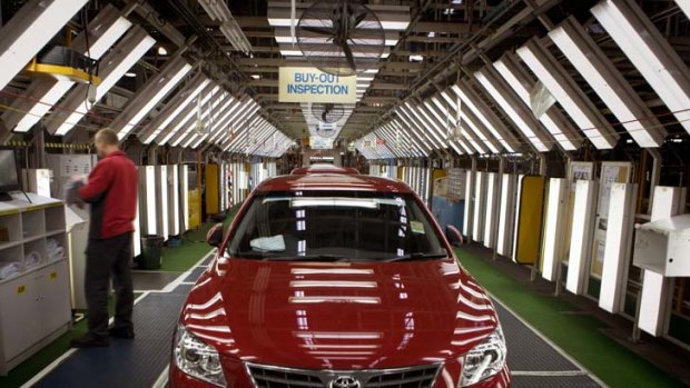 Carmakers are pushing for compensation for carbon tax costs.