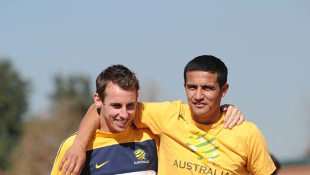 One more time ... Socceroos Luke Wilkshire and Tim Cahill.