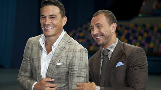 Heavyweights ... Boxing rugby stars Sonny Bill Williams and Quade Cooper pose for photos.