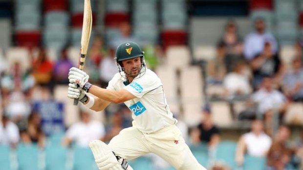 On the ball ... Ed Cowan batted his way to a century at Manuka Oval in Canberra yesterday.
