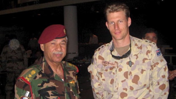 Language skills helped to break down barriers... Simon Ohmsen with an Iraqi general.
