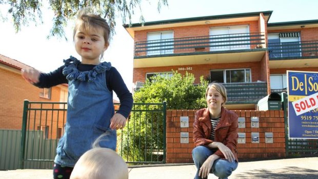 Fingers crossed &#8230; Laura Gregorace, with children Audrey, 3, and Oliver, 1, outside her Marrickville apartment block.