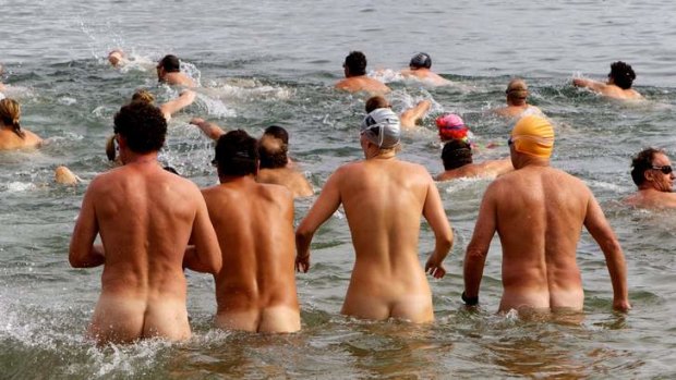 In the buff ... swimmers at the start of Sydney Skinny, a nude ocean swim at Cobblers Beach near Mosman.