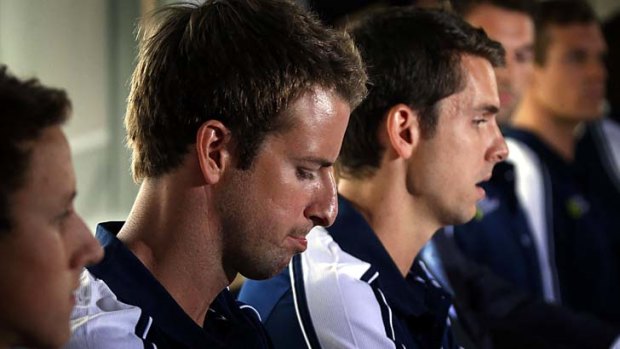 James Magnussen (2nd L) sits with teammates Cameron McEvoy (L) and Eamon Sullivan (R) from Australia's 4x100m freestyle relay team after its London debacle.