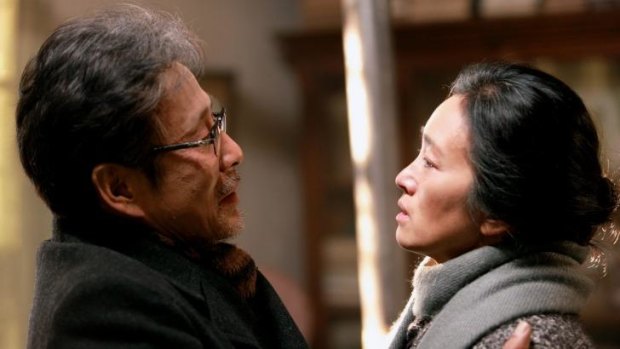 Chen Daoming and Gong Li star in <i>Coming Home</i>, a moving tale of yearning and missed connection.