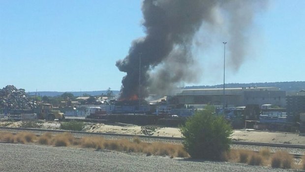 Up to 200 cars are on fire at the steel factory in Perth's east.