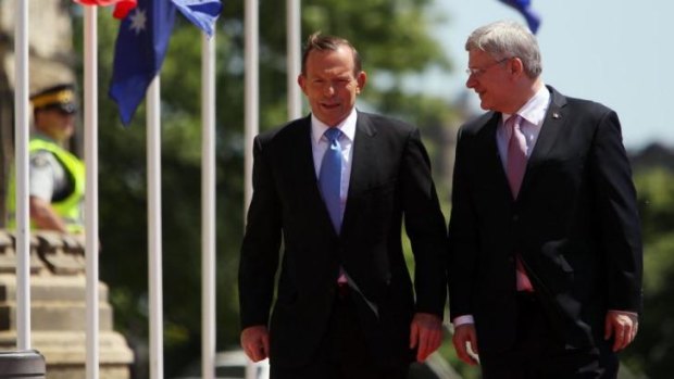 Conservative politicians Statement of intent: Canadian Prime Minister Stephen Harper with Australian Prime Minister Tony Abbott during welcoming ceremonies on Parliament Hill in Ottawa.