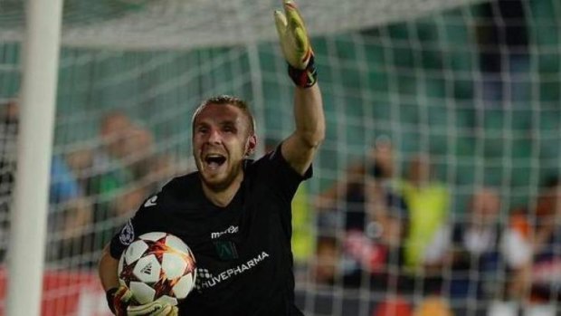 Cosmin Moti celebrates after one of his penalty saves.
