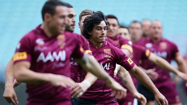 The big dance: Maroon Johnathan Thurston warming up in Sydney for the origin decider on Tuesday.