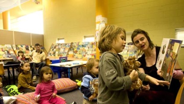 Community hub ... librarian Beth Koorey reads to children, including Sebastian Hill, 3, at Ultimo Library in Sydney during the week.