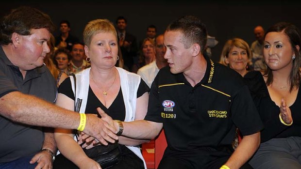 Tom Scully with dad Phil, mum Narja and sister Jess, when drafted by Melbourne in 2009.