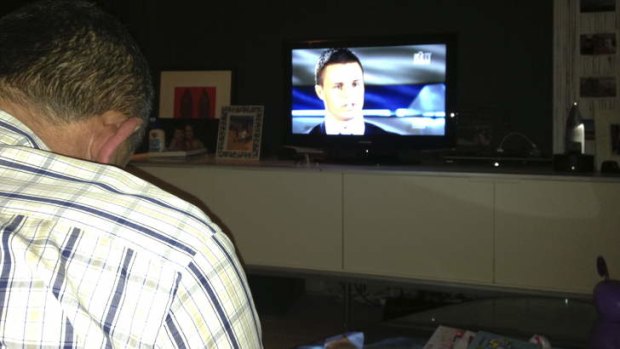 Hot seat: Stephen Dank watches the Sandor Earl interview on Thursday night.