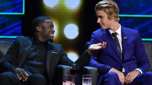 Roastmaster Kevin Hart and honoree Justin Bieber.