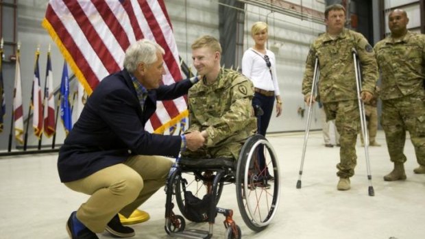 'Happy and gratified': US Defence Secretary Chuck Hagel honours soldiers at Bagram Air Base in Afghanistan, hours after the release of POW Sergeant Bowe Bergdahl.