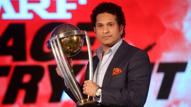 Sachin Tendulkar holds the ICC Cricket World Cup  2011 trophy during a promotional event  in Mumbai on February 7.